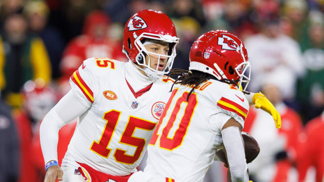 Dec 3, 2023; Green Bay, Wisconsin, USA; Kansas City Chiefs quarterback Patrick Mahomes (15) hands the football off to running back Isiah Pacheco (10) during the first quarter against the Green Bay Packers at Lambeau Field. Mandatory Credit: Jeff Hanisch-USA TODAY Sports